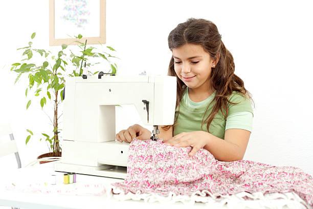 Girl with sewing machine